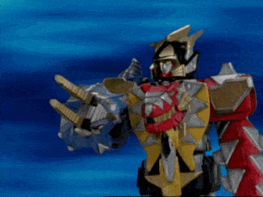 a robot with a light coming out of it 's mouth