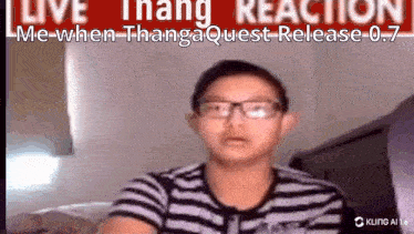 a young boy wearing glasses is sitting in front of a screen that says live thang reaction