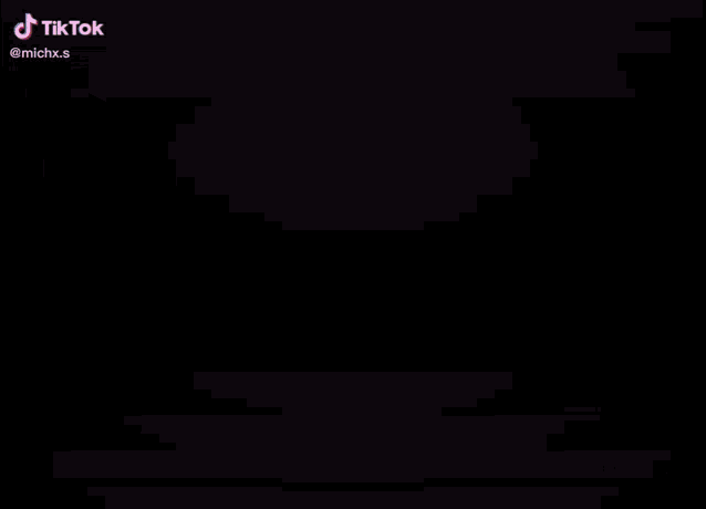 a close up of a person 's face with a purple background and the word tiktok on the bottom