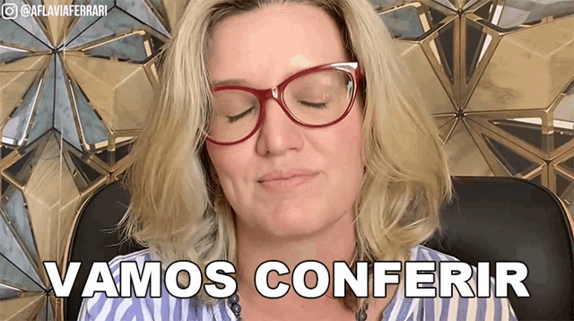 a woman wearing glasses says " vamos conferir "