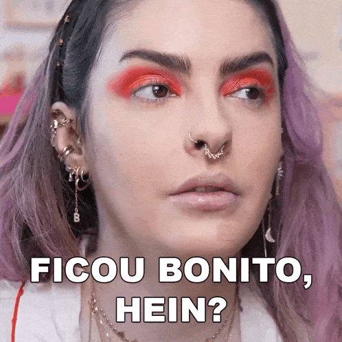 a close up of a woman 's face with the words ficou bonito hein below it
