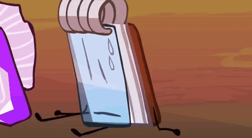 a cartoon drawing of a notepad with a face on it sitting on a wooden table .