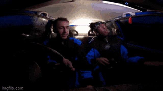 a man and a woman are sitting in a car with imgflip.com at the bottom of the screen