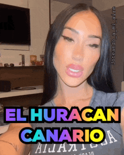 a woman with a t-shirt that says " el huracan canario "