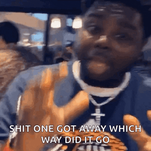 a man is eating a hamburger and says " shit one got away which way did it go "