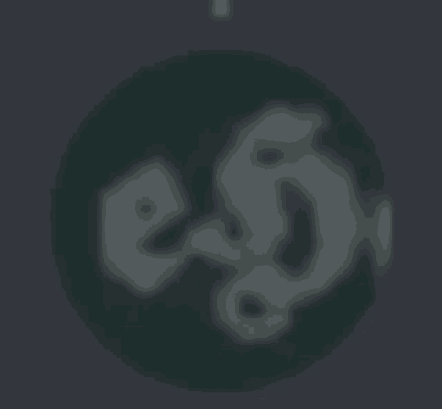 a blurred image of a circle with the letter e in it .