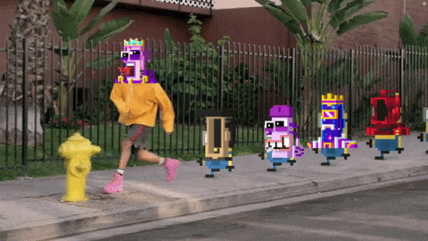 a person in a yellow sweatshirt is running down a sidewalk