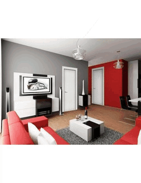 a living room with a red couch , a white coffee table , a television , and a red wall .