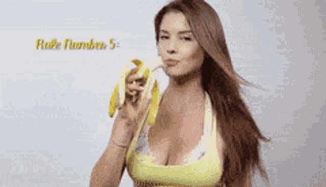 a woman in a yellow tank top is eating a banana with rule number 5 written on the bottom