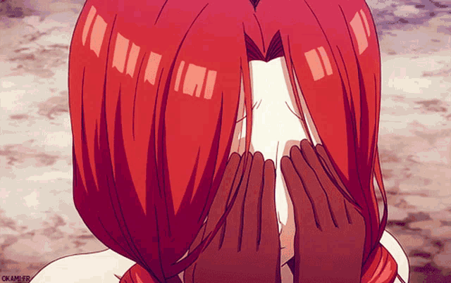 a girl with red hair is covering her face with her hands and a watermark that says okamifr