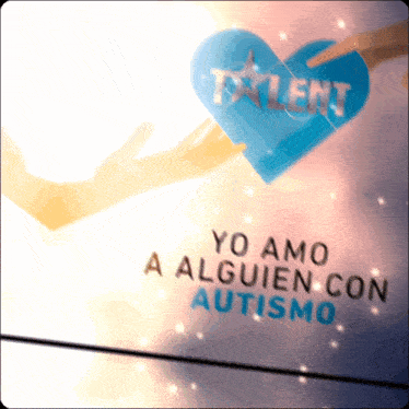 a person holding a blue heart with the word talent on it