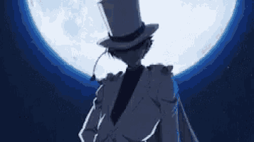 a man in a top hat is standing in front of a full moon in the night sky .
