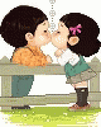 a boy and a girl are kissing behind a fence .