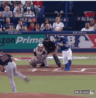 a baseball game is being played in front of an amazon prime sign