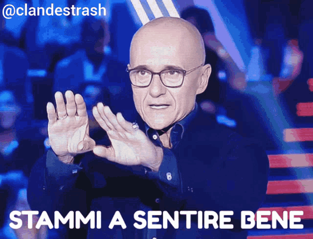 a bald man with glasses and the words " stammi a sentire bene "