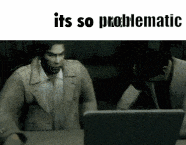 two men are looking at a laptop with the words it 's so problematic