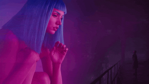 a woman with blue hair and the words jij gaat fio on the bottom