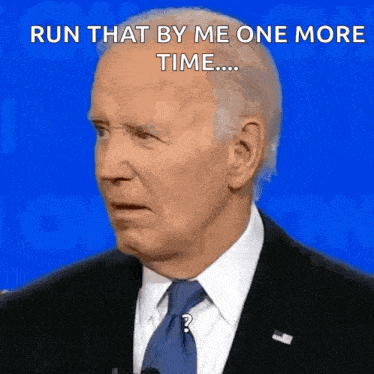 a man in a suit and tie is saying " run that by me one more time "