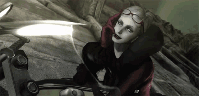 a woman with glasses and red lipstick is sitting on a motorcycle