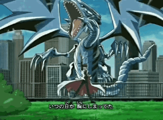 a man is standing in front of a giant dragon with chinese writing on it
