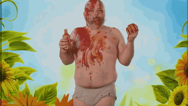 a shirtless man covered in ketchup holding a bottle