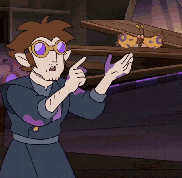 a cartoon character wearing goggles is pointing