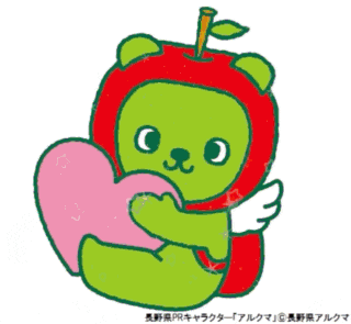 a young man is holding a green toy in his hand and smiling .