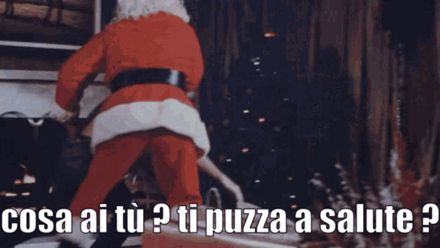 a picture of santa claus with the words cosa ai tu ti puzza a salute on the bottom