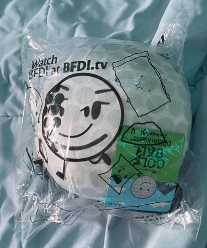 a stuffed animal in a plastic bag that says watch bfdi.tv