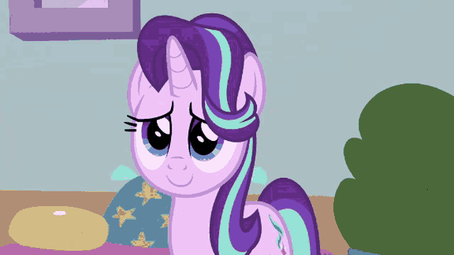 a cartoon pony with purple hair and blue stripes