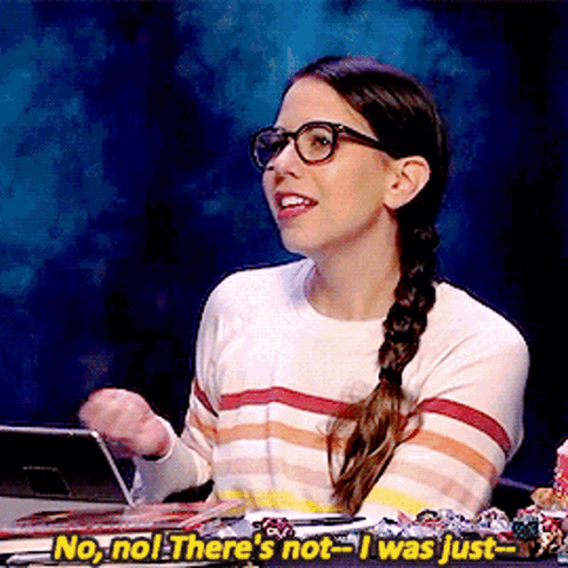 a woman wearing glasses says " no no there 's not "