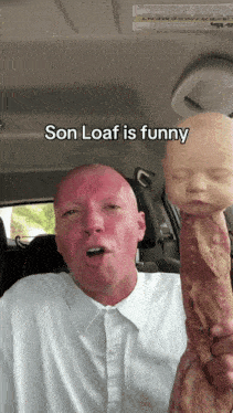 a man in a white shirt is holding a loaf of bacon with a baby head on it