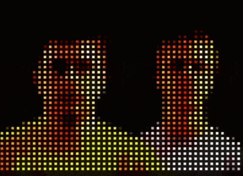 a pixelated image of two people 's faces with red and yellow squares on them