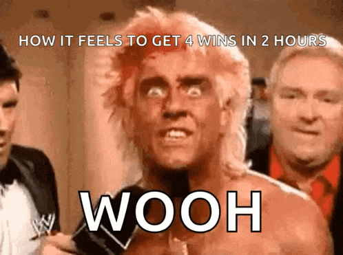 a man with a bloody head says wooh in front of a group of men
