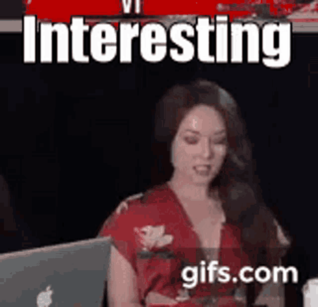 a woman is sitting in front of a laptop with the words interesting gifs.com above her