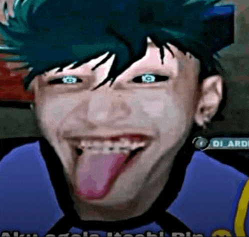 a man with green hair is sticking his tongue out .