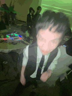 a blurry picture of a man in a suit and tie