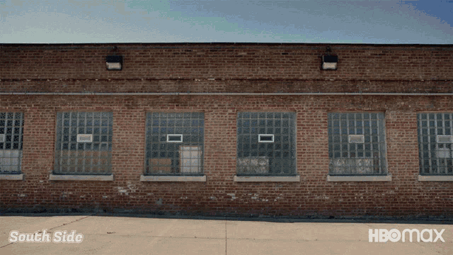 a brick building with the word south side on the bottom
