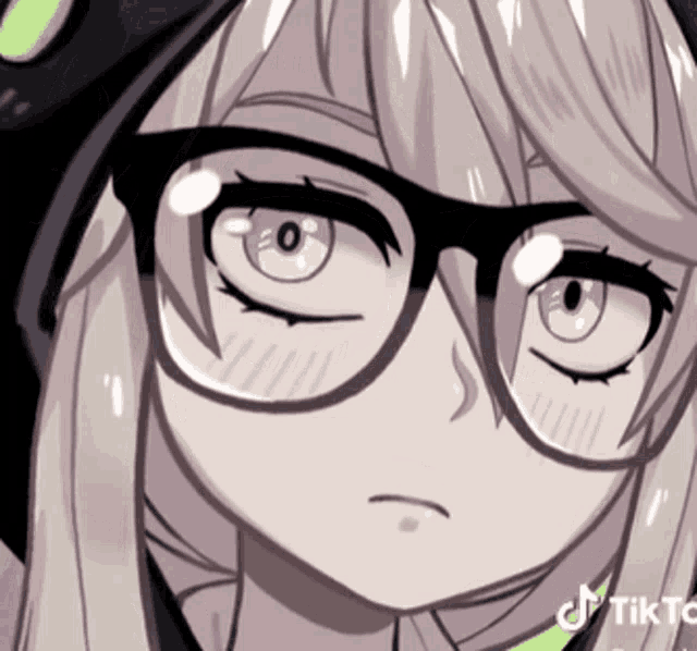 a close up of a girl wearing glasses with tiktok written in the corner