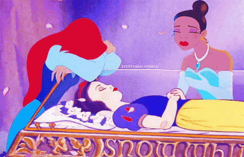 ariel kisses snow white while ariel looks on