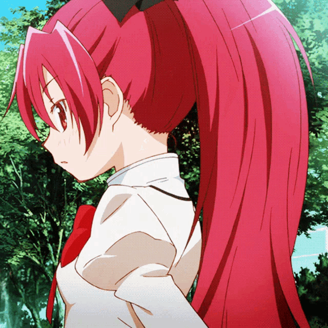 a girl with long red hair is wearing a white shirt and red tie