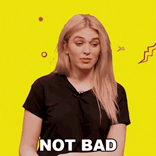 a woman in a black shirt is saying " not bad "