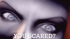 a close up of a woman 's face with the words " you scared " written above it