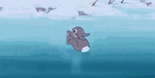 a cartoon rabbit is swimming in a lake .