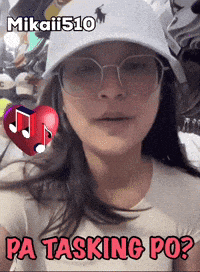 a woman wearing glasses and a hat with the name mikaili510 on it