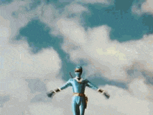 a superhero is standing in front of a cloudy sky holding a sword .