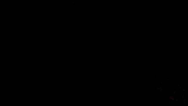 a close up of a woman 's breasts in a black top