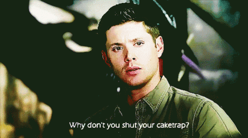 a man in a green shirt says " why don t you shut your caketrap "