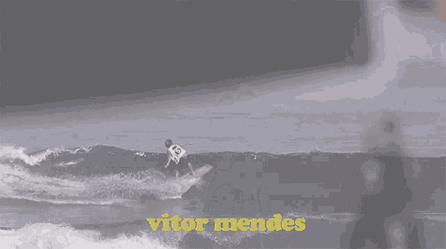 a surfer is riding a wave in the water