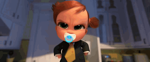 a baby girl with a pacifier in her mouth is wearing a suit and tie